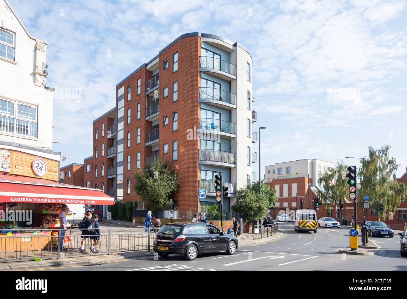 Sunset apartment building food shop high street wealdstone traff hires