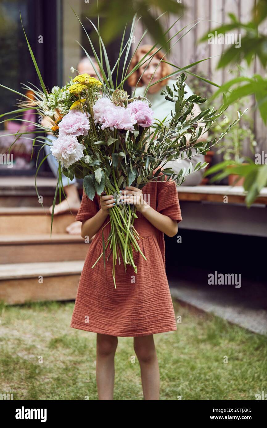 Girl with flowers in her head hi-res stock photography and images - Alamy
