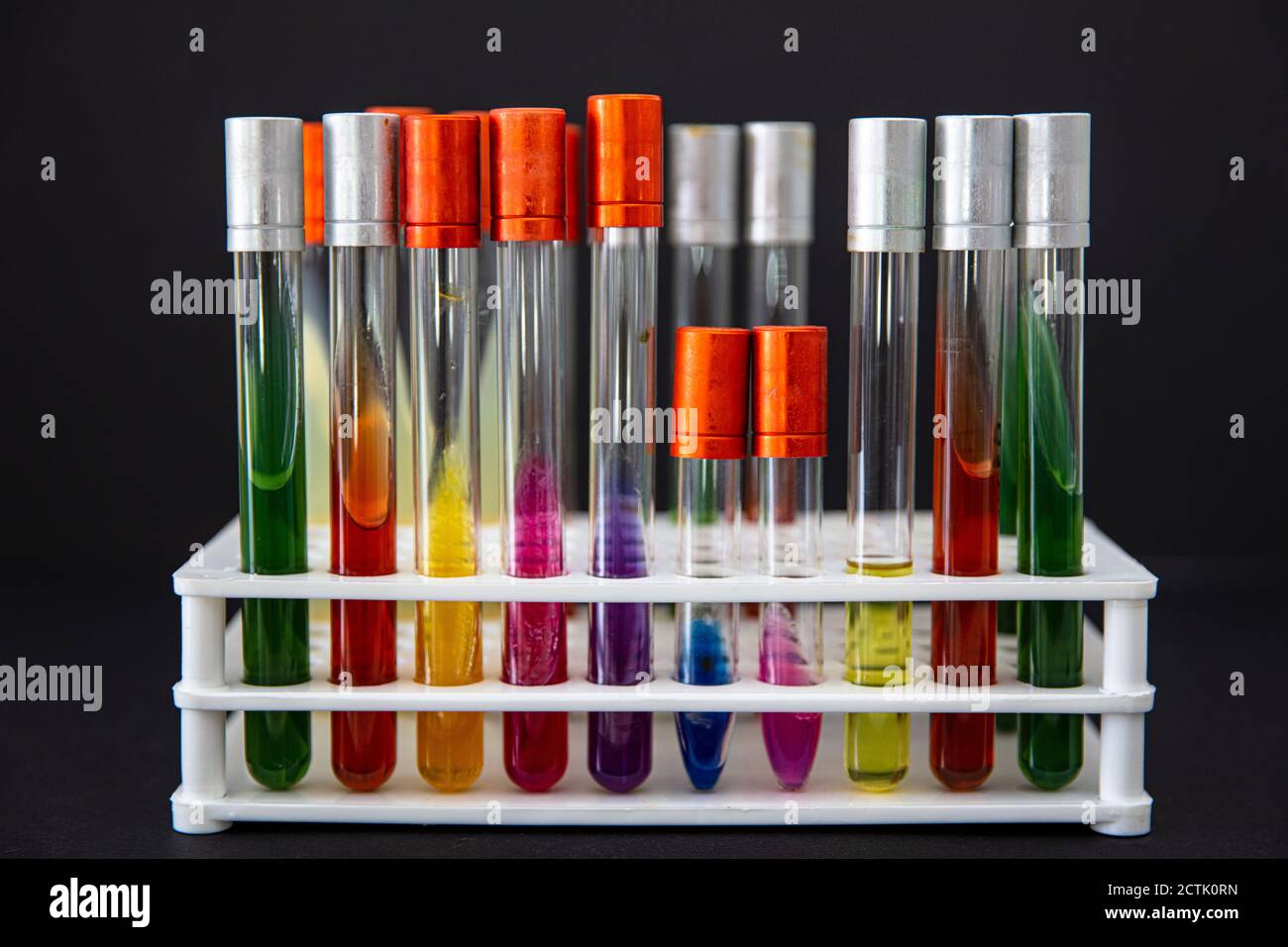 colorful rows of laboratory test tubes , science background. Laboratory ...