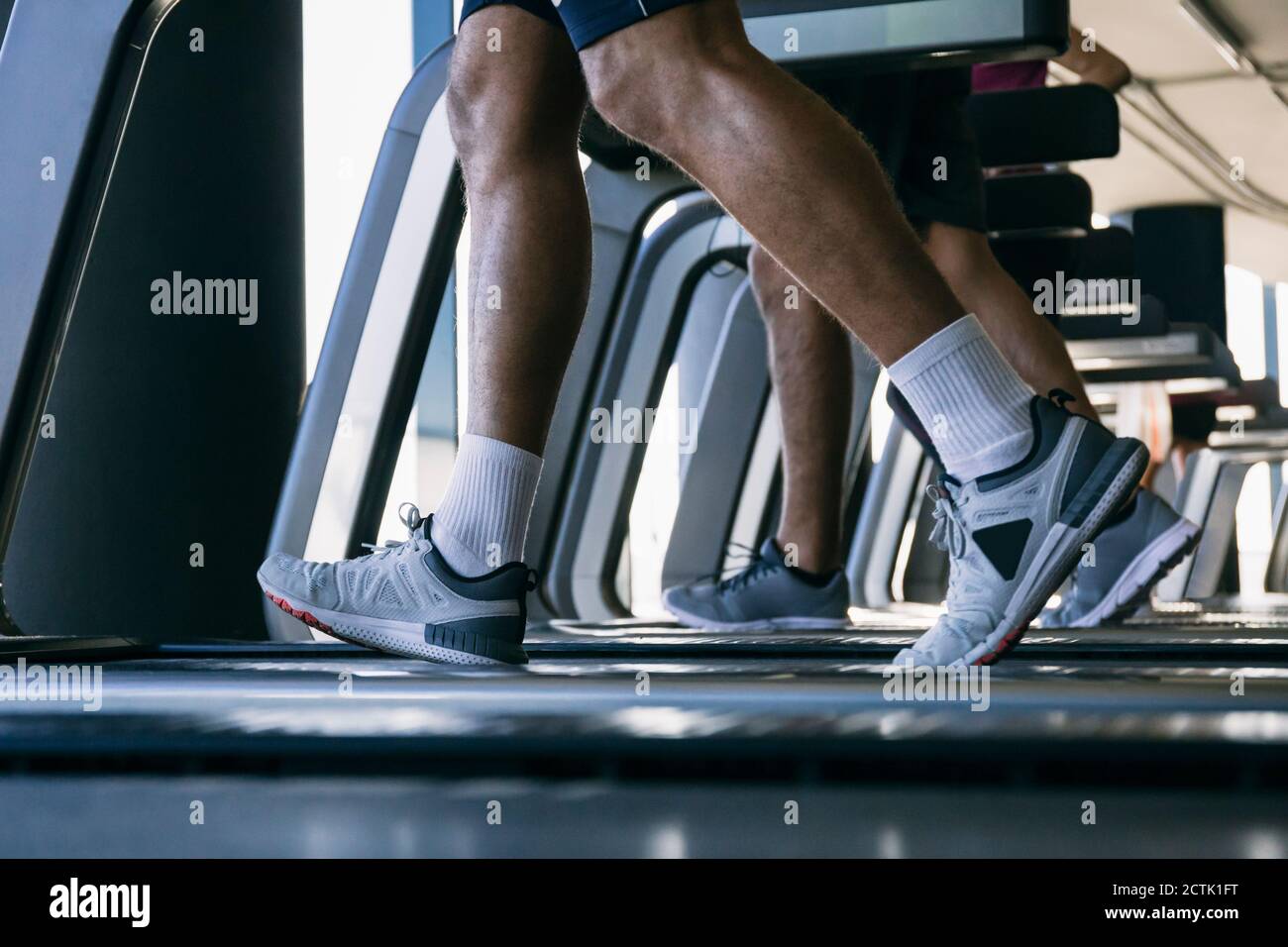 Running in socks hi-res stock photography and images - Alamy