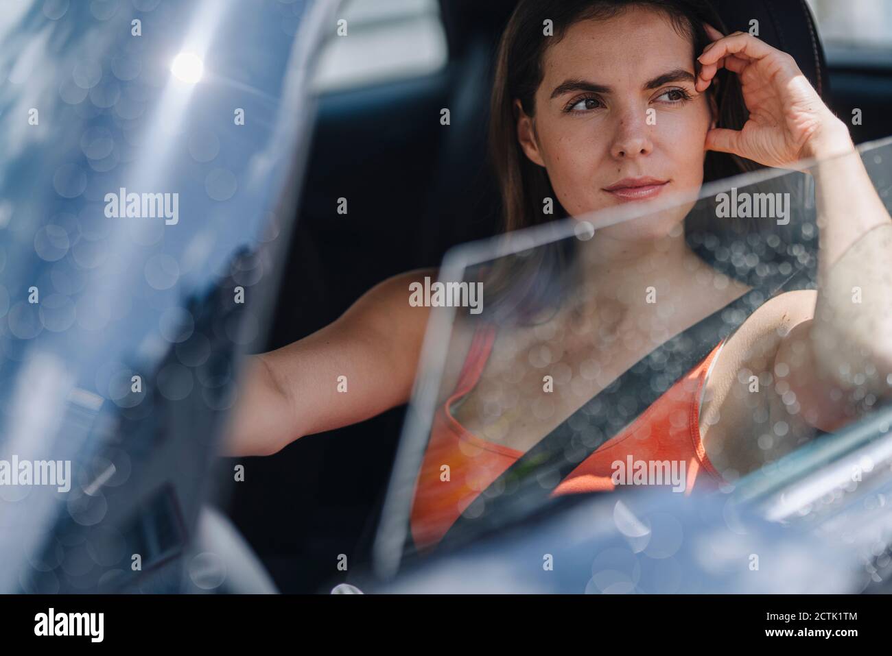 Woman in front seat of car hi-res stock photography and images - Alamy