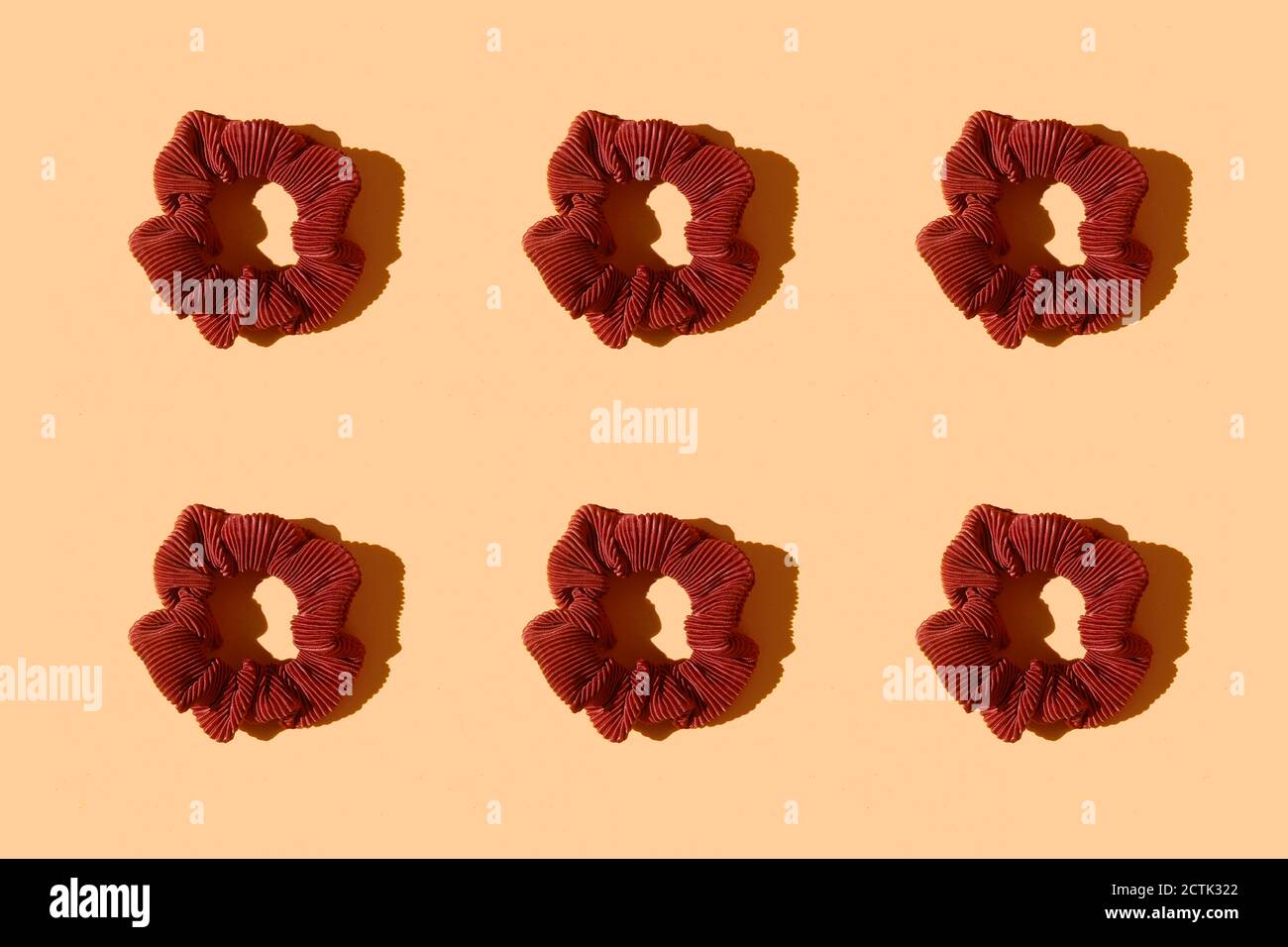 Pattern of brown scrunchies Stock Photo