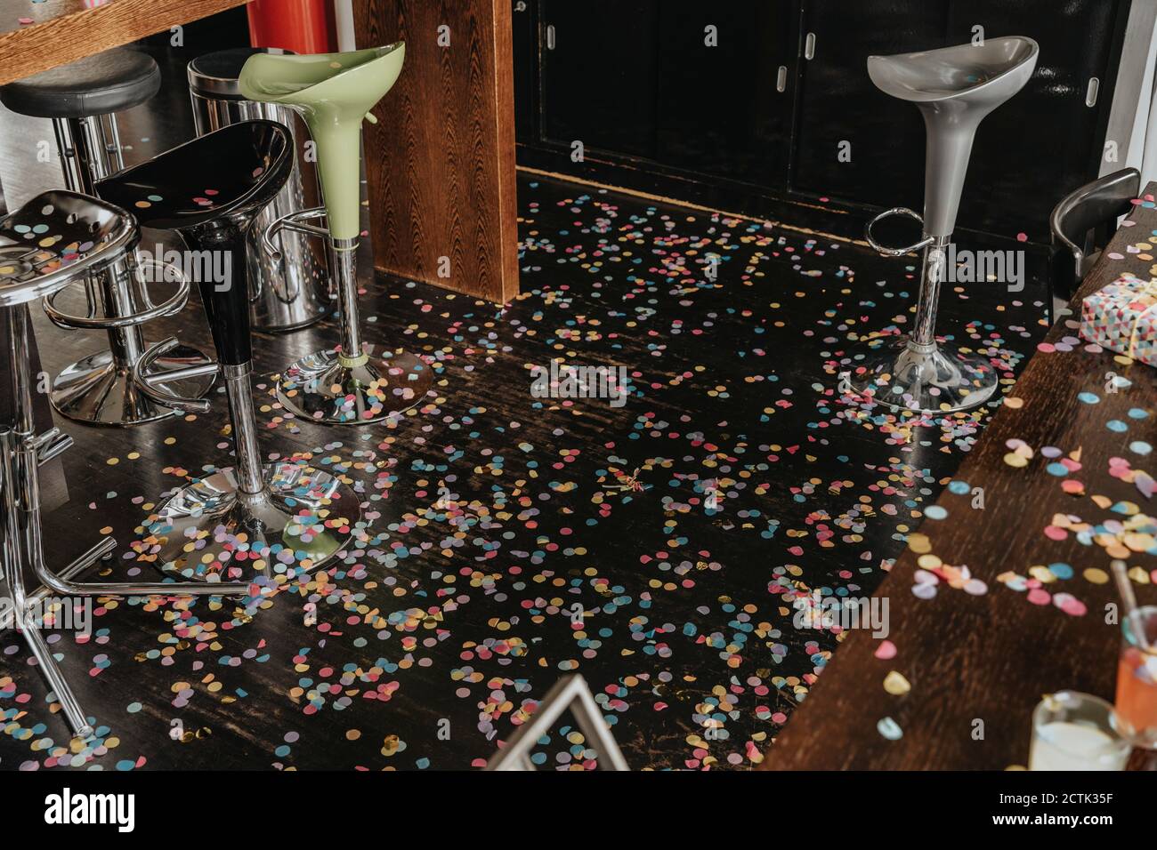 Confetti on floor at home after party Stock Photo
