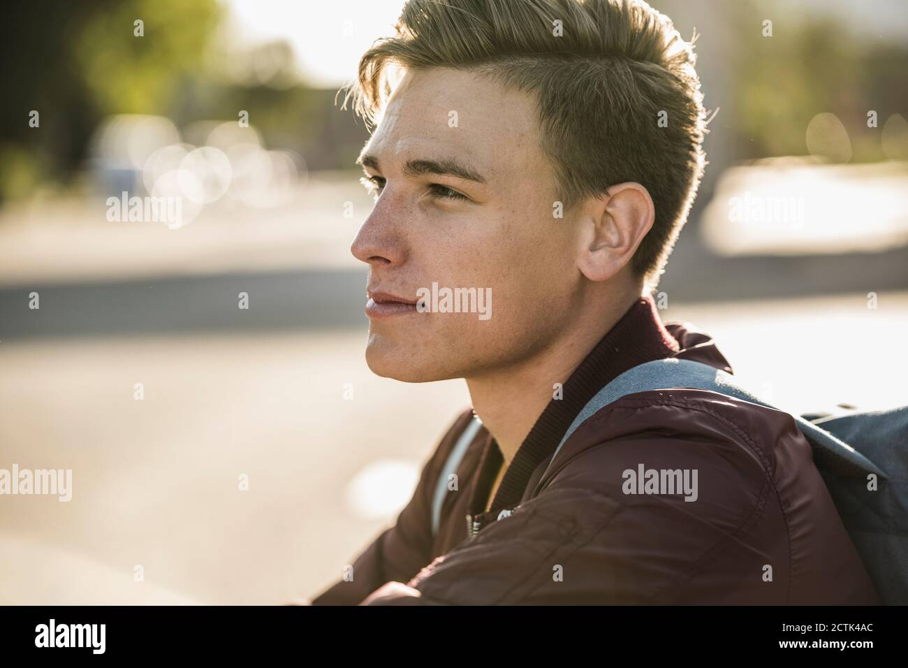 Thoughtful handsome young man looking away Stock Photo
