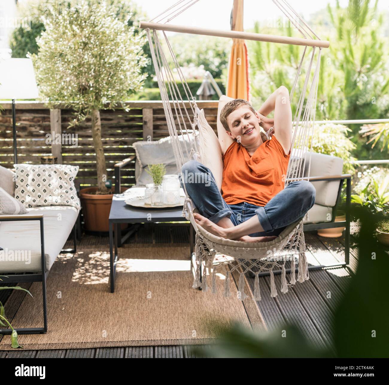 Woman Sitting On Porch Veranda High Resolution Stock Photography and ...