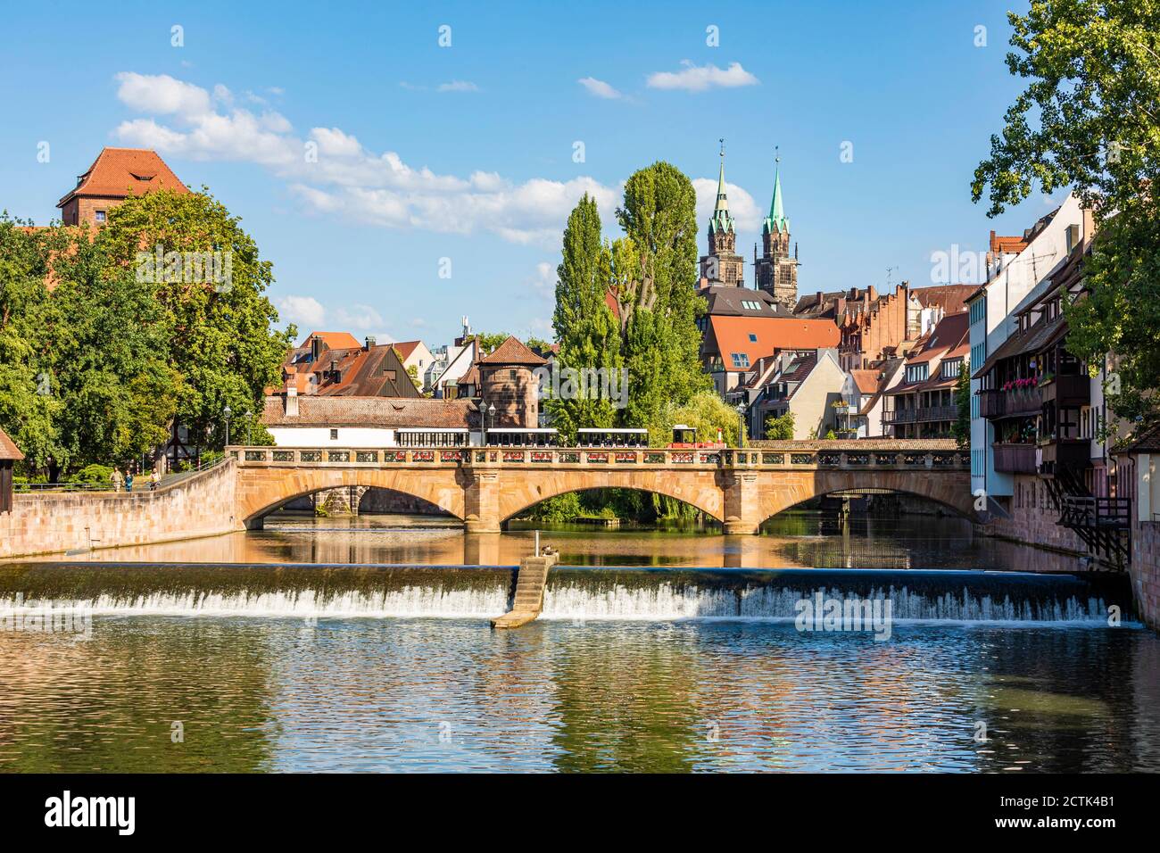 Germany, Bavaria, Nuremberg, Maxbrucke with old town buildings in background Stock Photo
