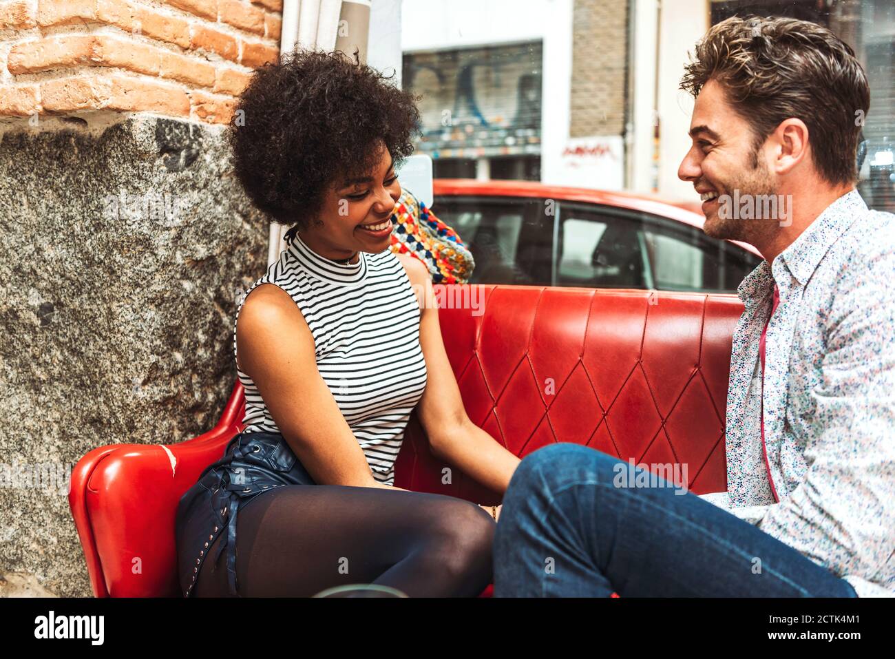 Two women talking sofa couch hi-res stock photography and images - Alamy