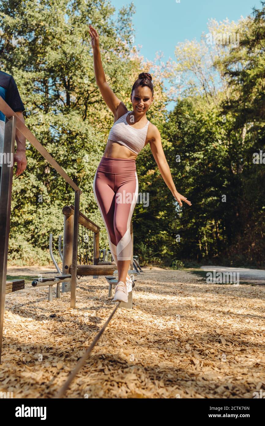Man balancing on rope hi-res stock photography and images - Alamy