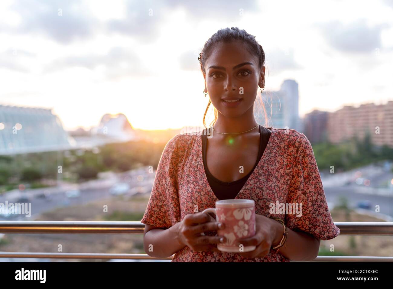 Indian woman standing in balcony hi-res stock photography and images ...