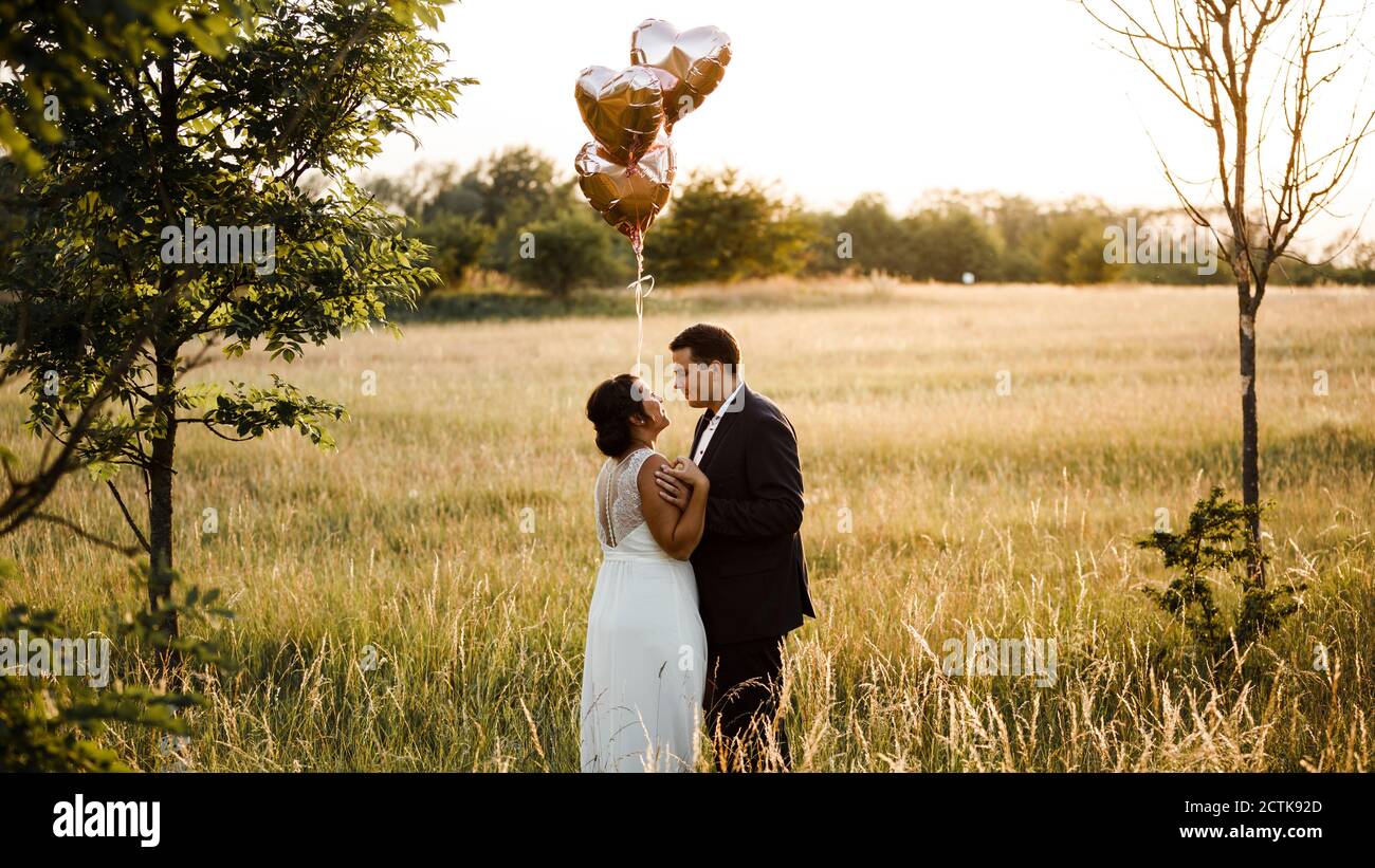 Couple heart shape balloons hi-res stock photography and images - Alamy
