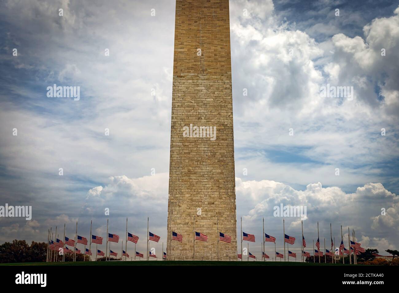 Flags at halfmast in Washington, DC at the Washington Monument Stock