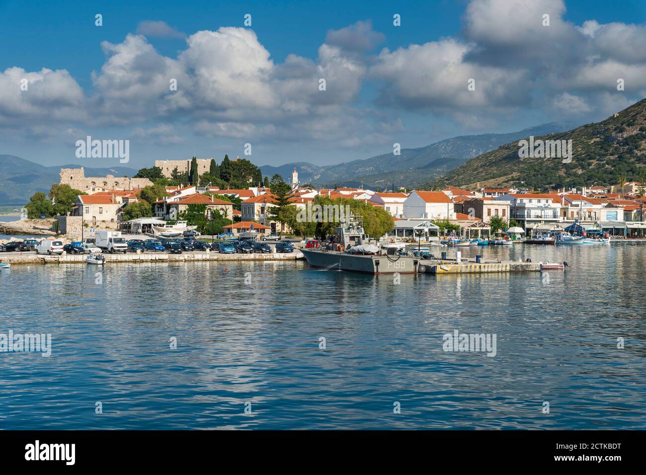 Greece, North Aegean, Pythagoreio, Clouds over harbor of coastal town in summer Stock Photo