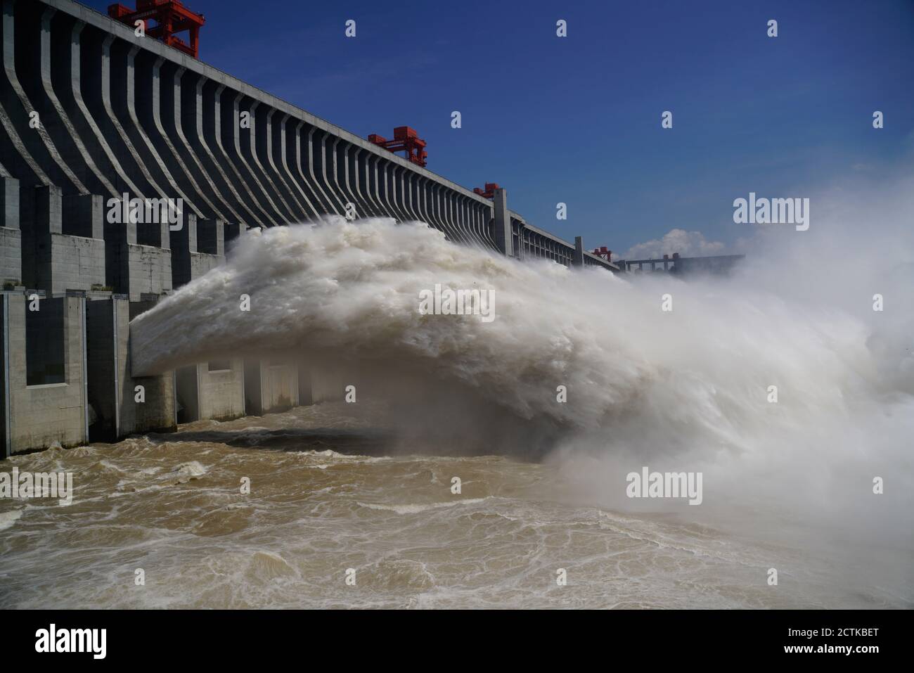 Floodgates of the Three Gorges Dam are opened to releasing 2020's fourth flood, whose flood peak is the largest of the year and the third largest afte Stock Photo