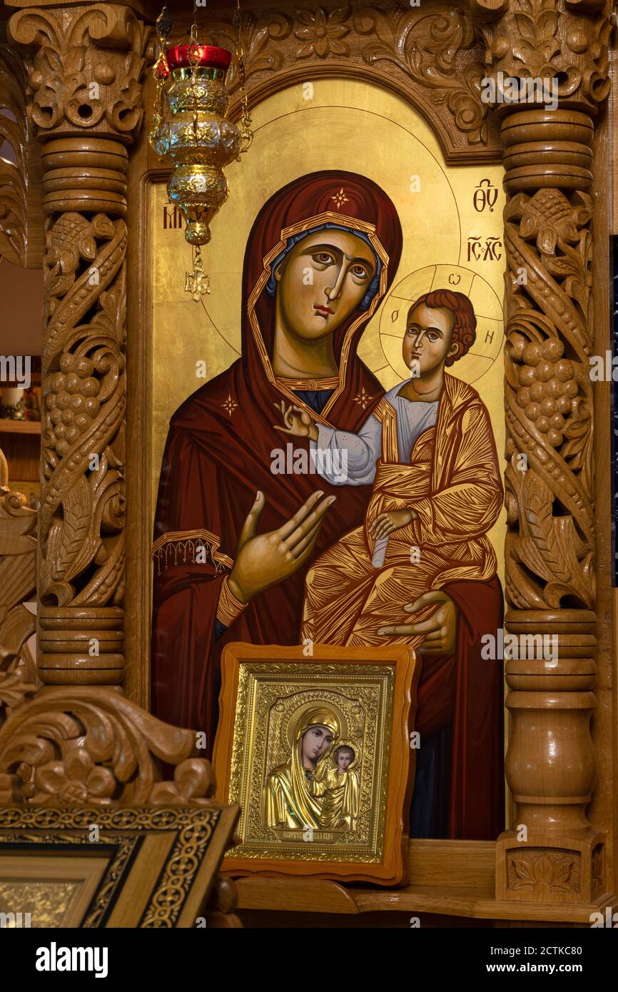 Orthodox icon on a church iconostasis. When worshipers enters the church they will kiss this icon and cross themselves. Stock Photo