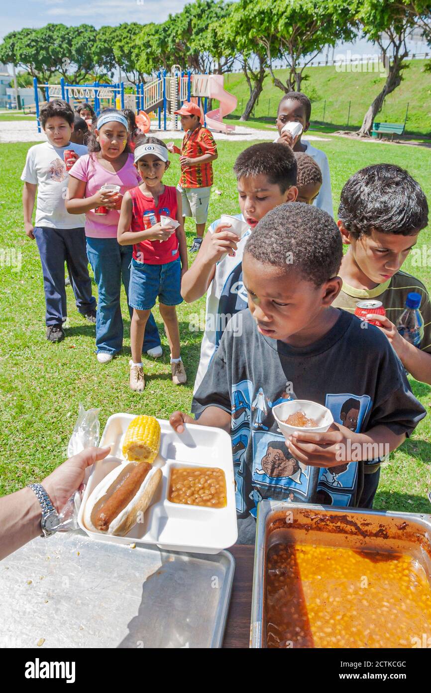 Miami Florida,Frederick Douglass Elementary School campus primary,inner city school day before summer vacation starts class picnic,student students li Stock Photo