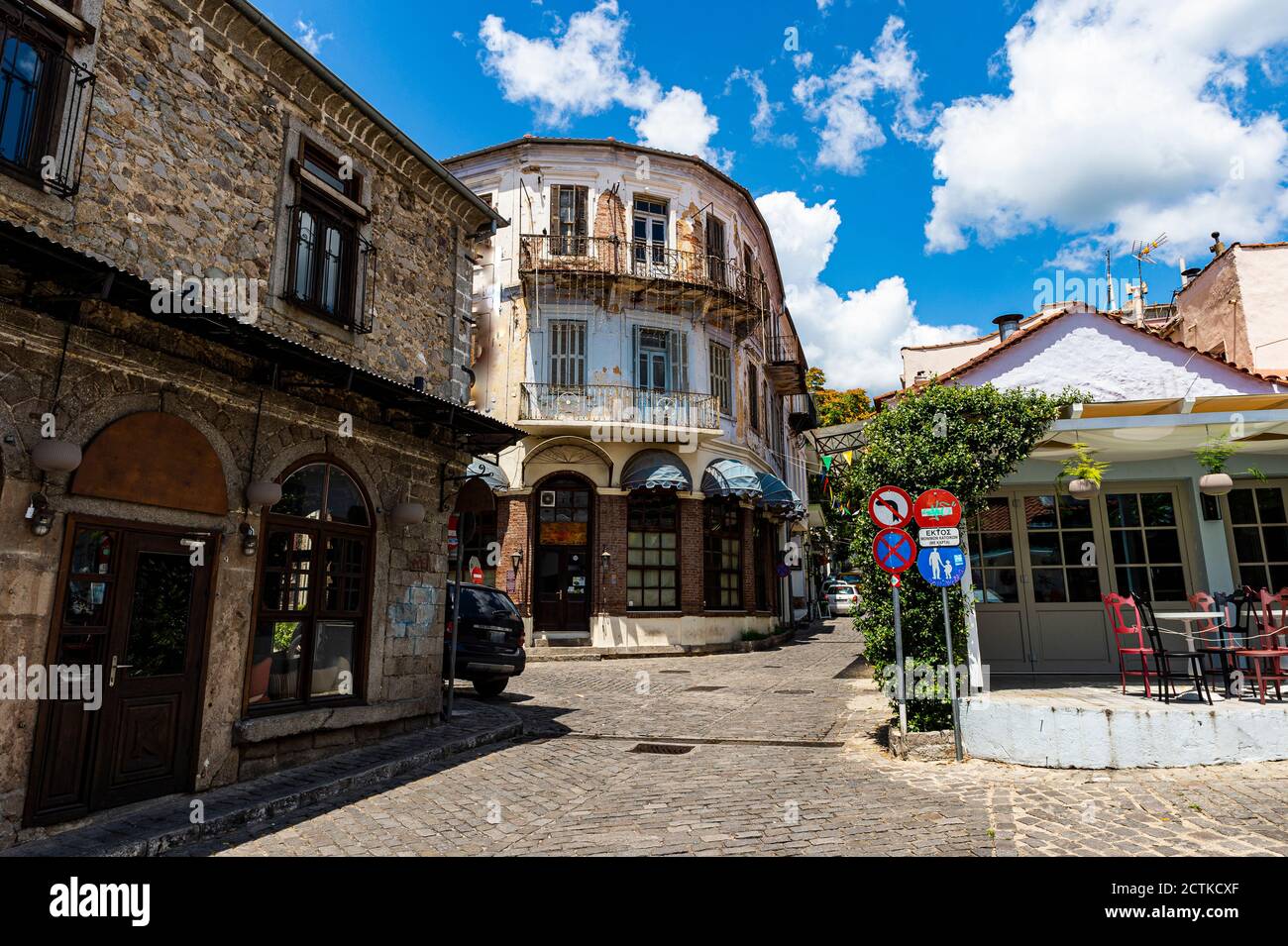 Greece, Eastern Macedonia and Thrace, Xanthi, Old Ottoman houses along empty cobblestone street Stock Photo