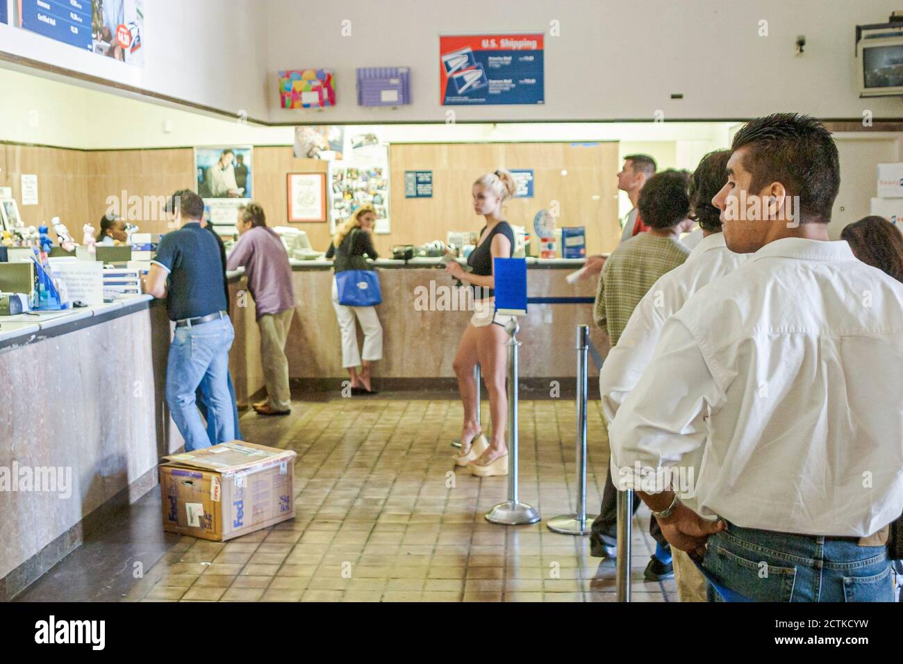 Miami Beach Florida,US Post Office,long line queue people customers waiting,counter counters, Stock Photo