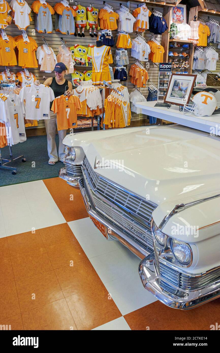 Sevierville Tennessee,Governor's Crossing Outlet Mall,Hound Dog inside interior display sale university orange sports clothing Cadillac, Stock Photo