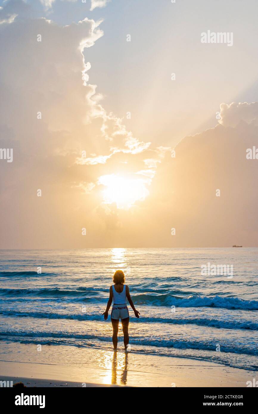 Miami Beach Florida,Atlantic Ocean shoreline,sunrise clouds sky weather,beachcomber sun waves water surf, Stock Photo