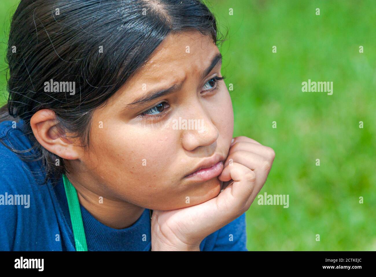 Miami Florida,Hispanic teen teenager girl,moody unhappy sad thinking upset, Stock Photo