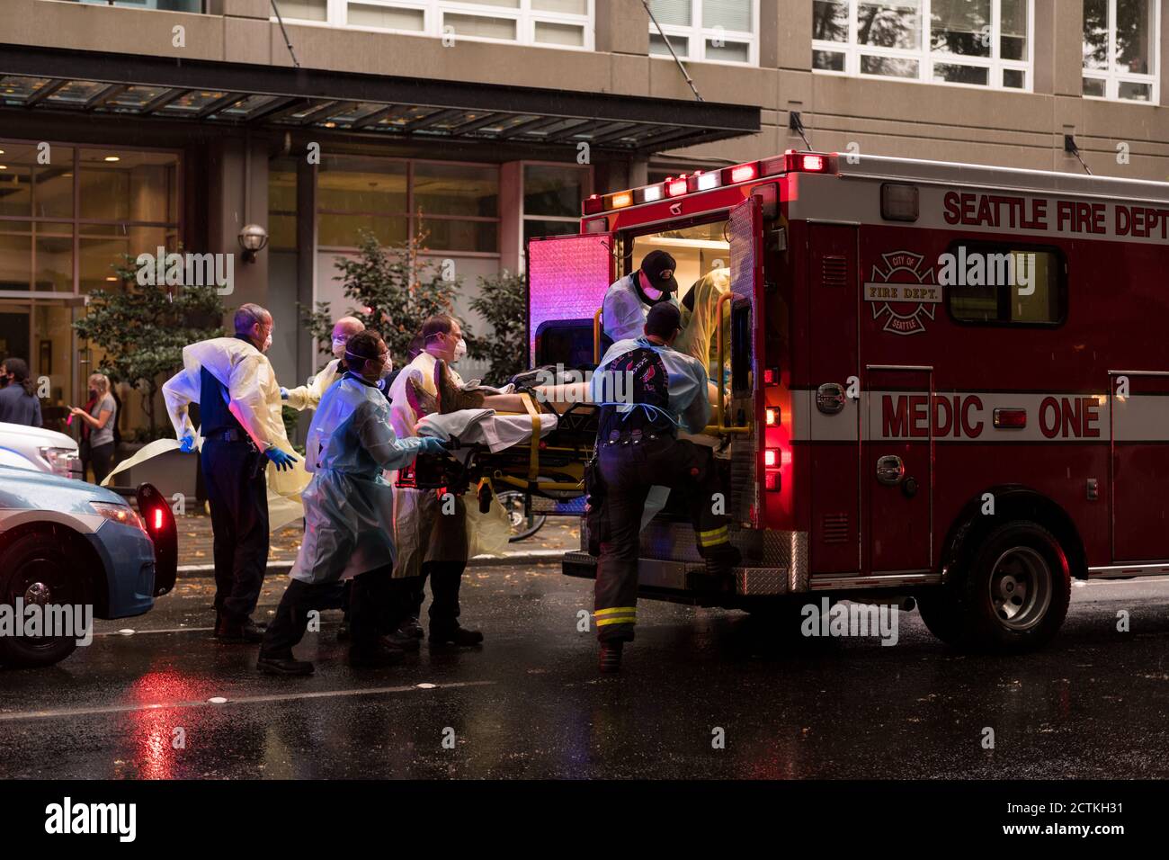 Seattle, USA. 23rd Sep, 2020. Paramedics transport a stabbing victim in