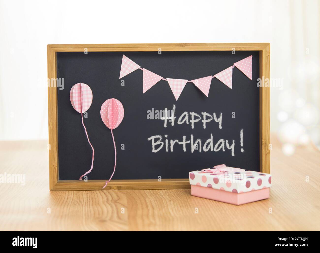 Happy Birthday blackboard. Cute background with pink decoration Stock