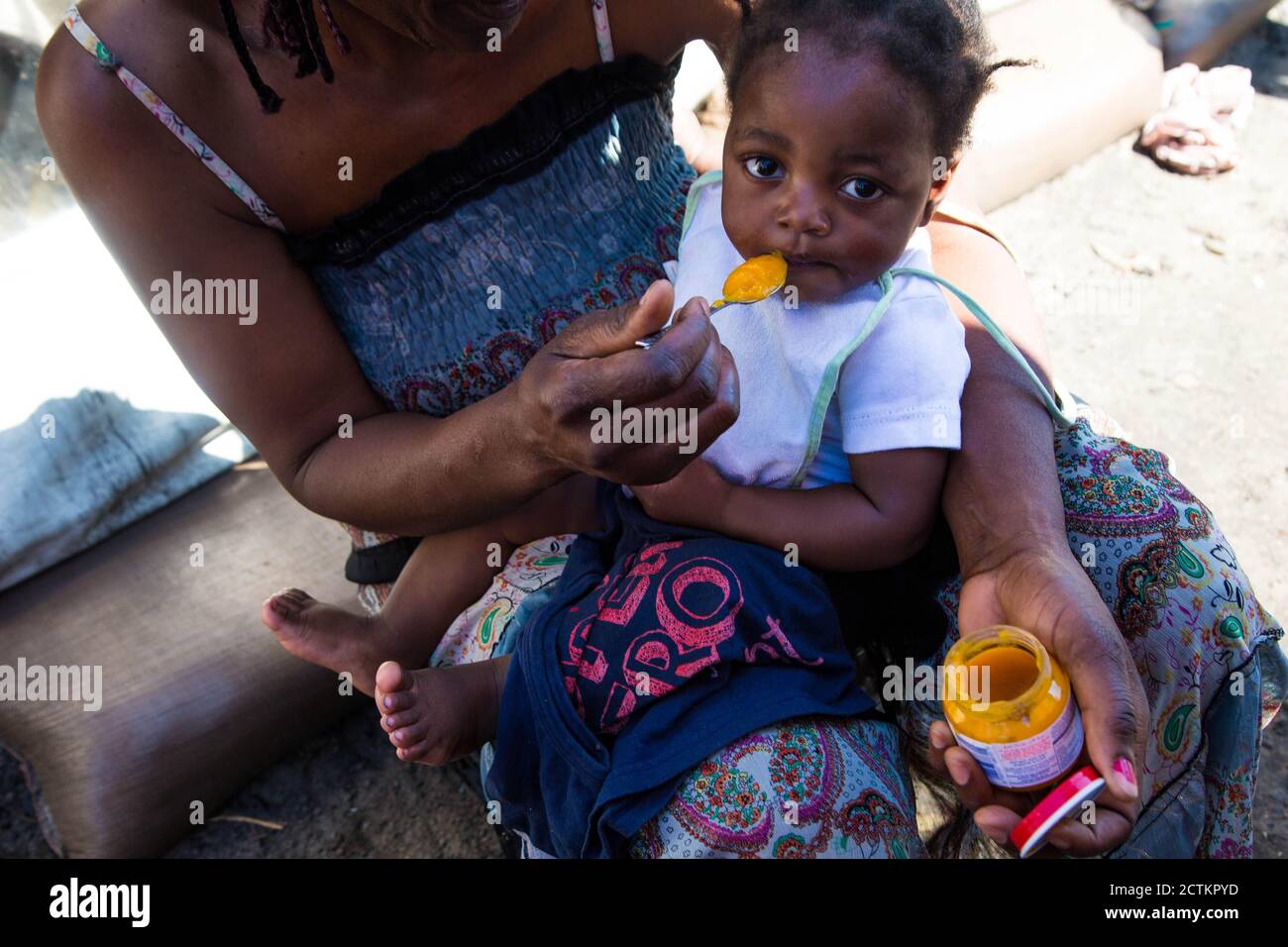 Cape Town South Africa 23rd Sep 2020 A Woman Feeds Her Child At A Refugee Camp