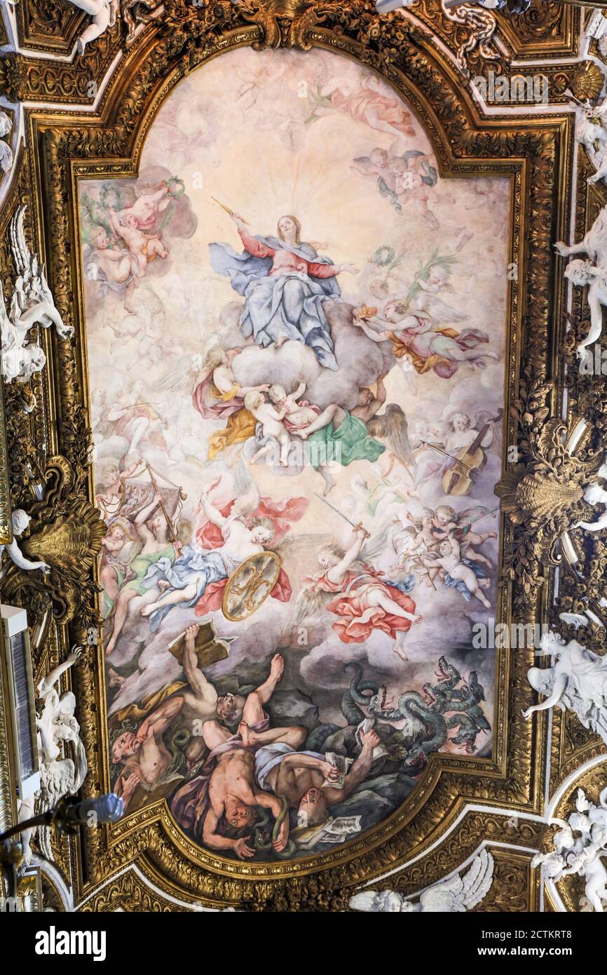 Rome, Lazio region, Italy.   The Virgin Mary Triumphing over Heresy and Fall of the Rebel Angels, in the ceiling of Santa Maria della Vittoria.  (For Stock Photo