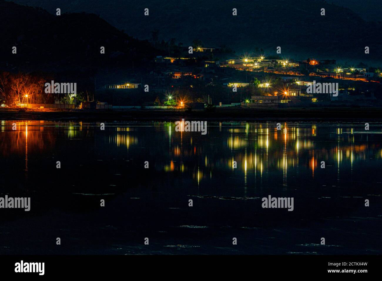 night landscape photography with stars and moon light of Pakistan Stock