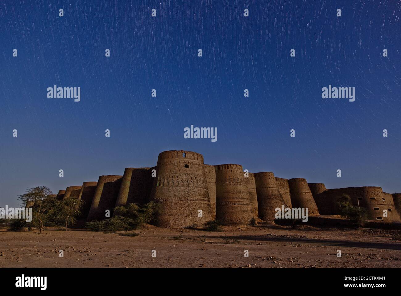 night landscape photography with stars and moon light of Pakistan Stock