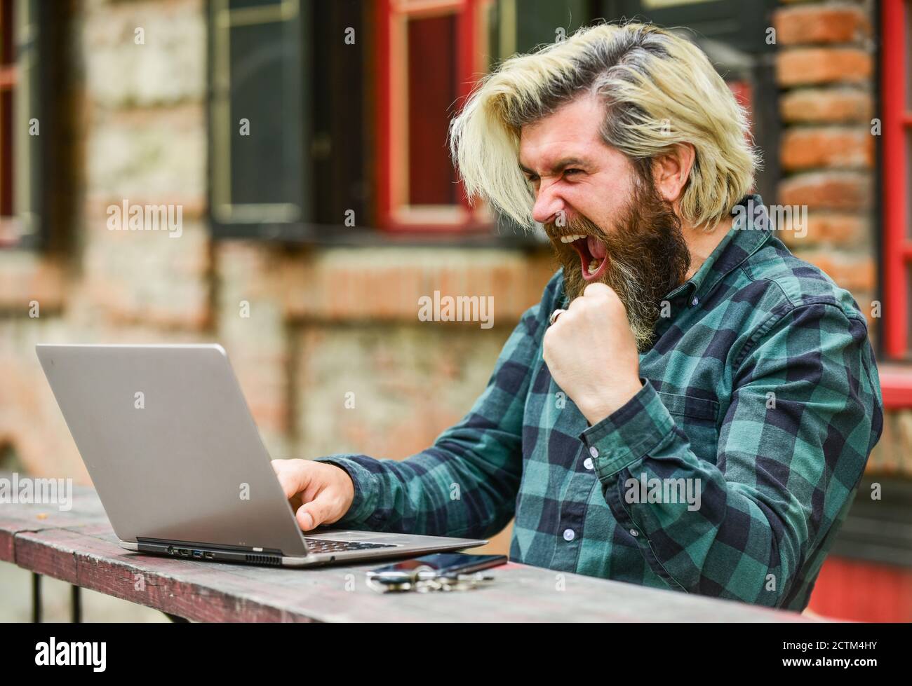 Modern communication. Risky shopping. Stock trader. Online business. Online entrepreneur working outdoors. Man busy work with laptop. Businessman laptop terrace. Online education. Surfing internet. Stock Photo