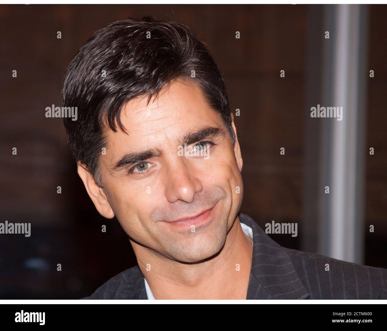 John Stamos, most famous as playing Uncle Jesse in the show Full & Fuller House attends a Broadway Premiere Stock Photo