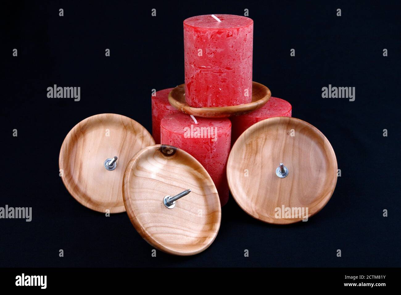 Some wooden turned holders for candles Stock Photo