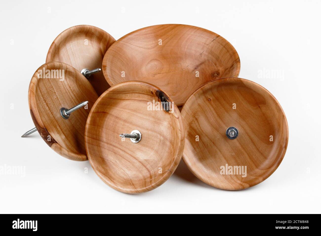 Some wooden turned holders for candles Stock Photo