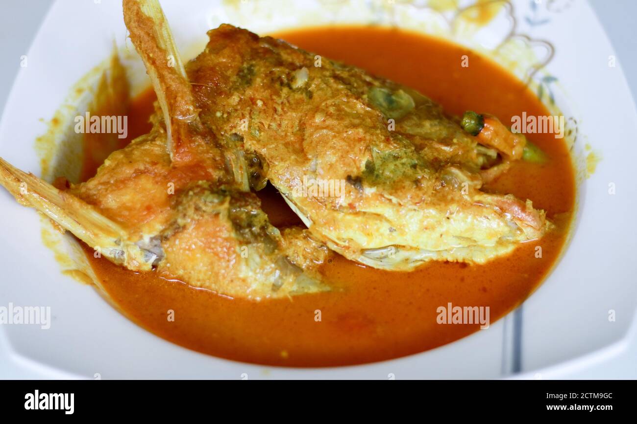 Snapper Head Gulai Curry On White Background Gulai Is Type Of Food Containing Rich Spicy And Succulent Curry Stock Photo Alamy