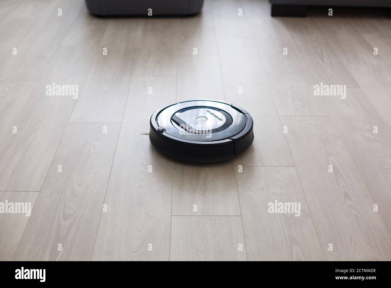 robotic vacuum cleaner on the floor Stock Photo Alamy