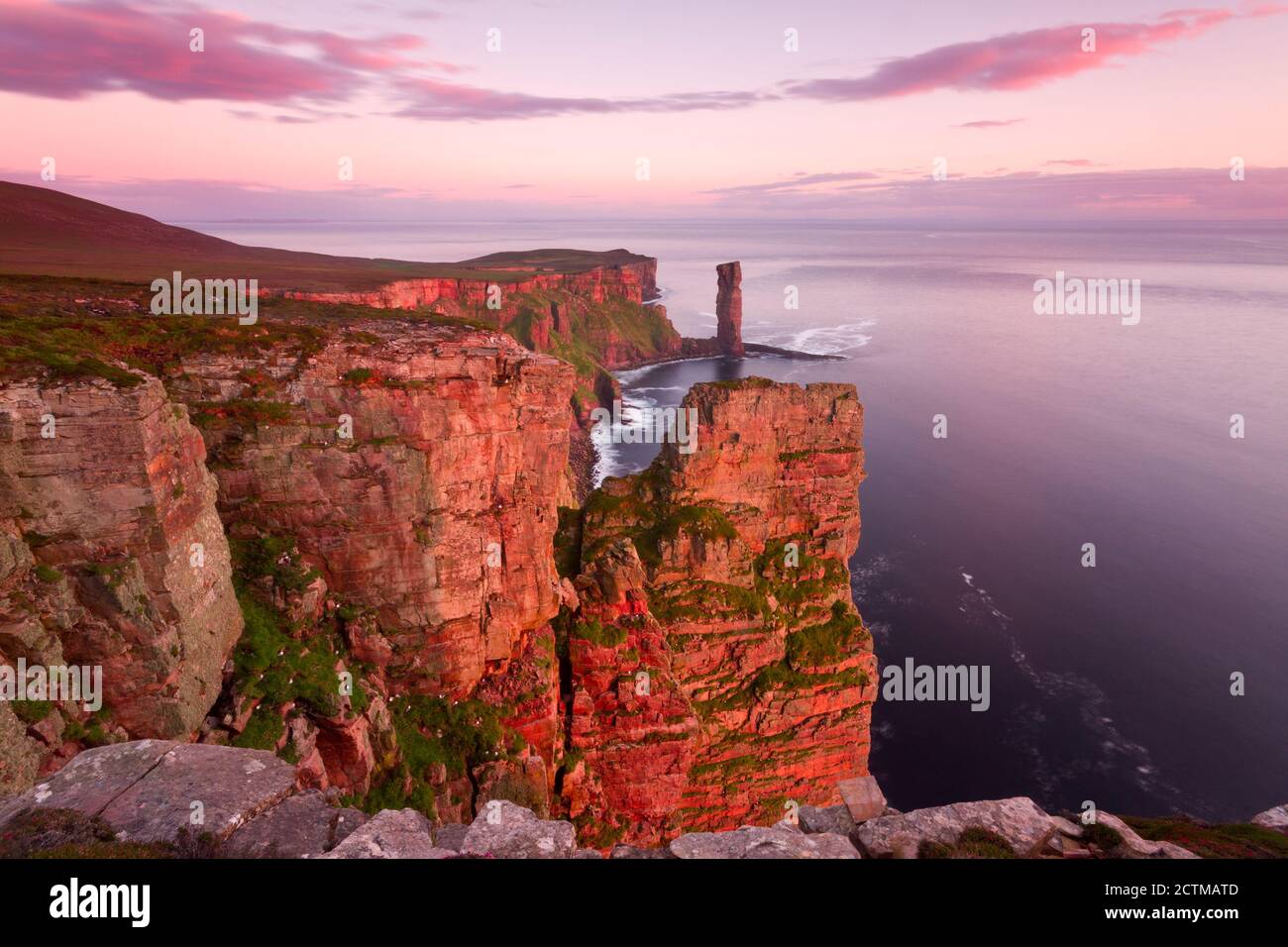 Sandstone cliffs of Hoy at sunset, Orkney Isles Stock Photo
