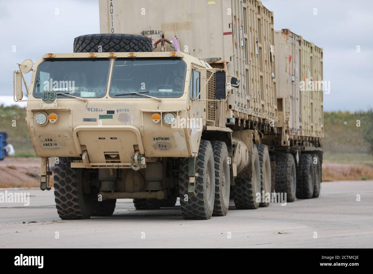 A load handling system vehicle with 4th Infantry Division Sustainment Brigade transports containers at Fort Carson, California, September 9, 2020. The 1st SBCT conducted operations in to return vehicles and equipment back to unit motor pools and work areas following National Training Center rotation 20-09. (U.S. Army photo by Capt. Daniel Parker) Stock Photo