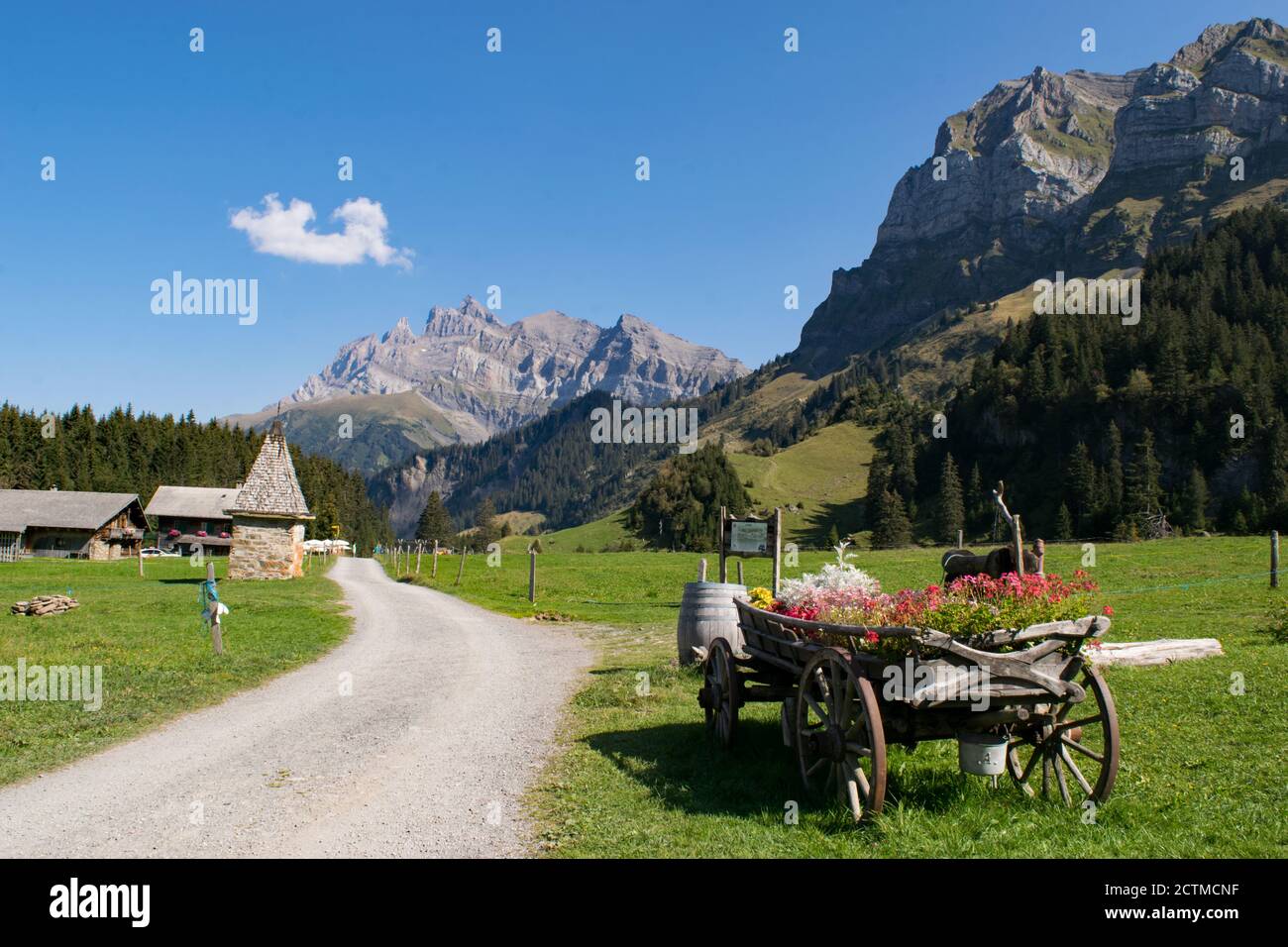 Alpine view with restaurants and flower cart Stock Photo