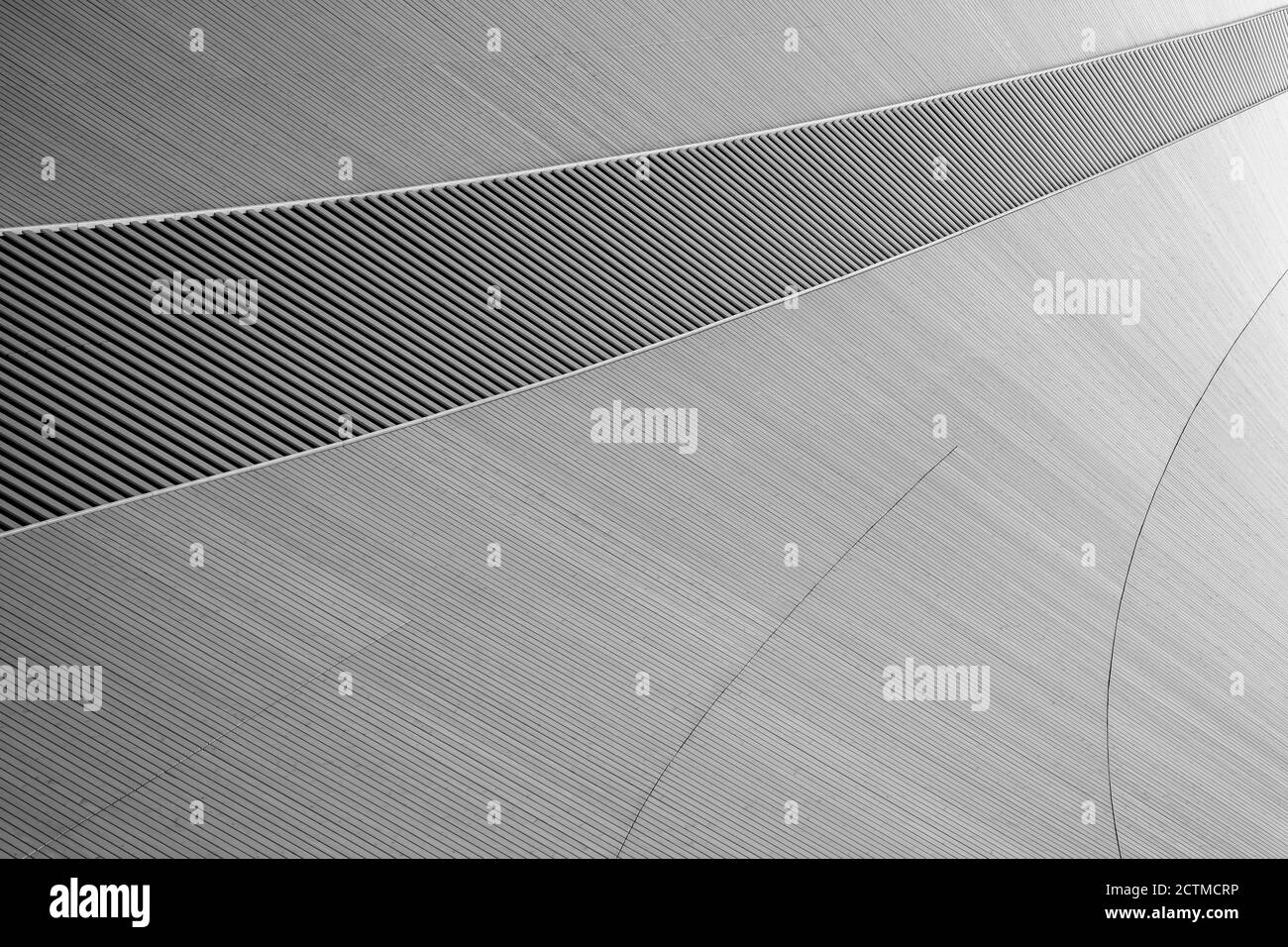 Abstract and modern ceiling made of spruce tree's wood boards in black and white. Viewed from below. High resolution full frame textured background. Stock Photo