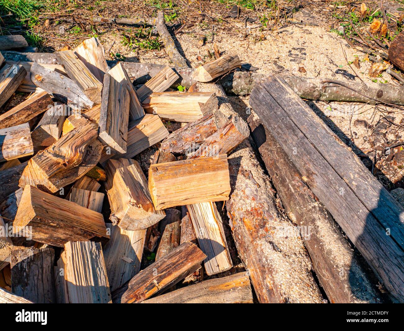 Wood chopped with an ax for heating a rural house. Stock Photo