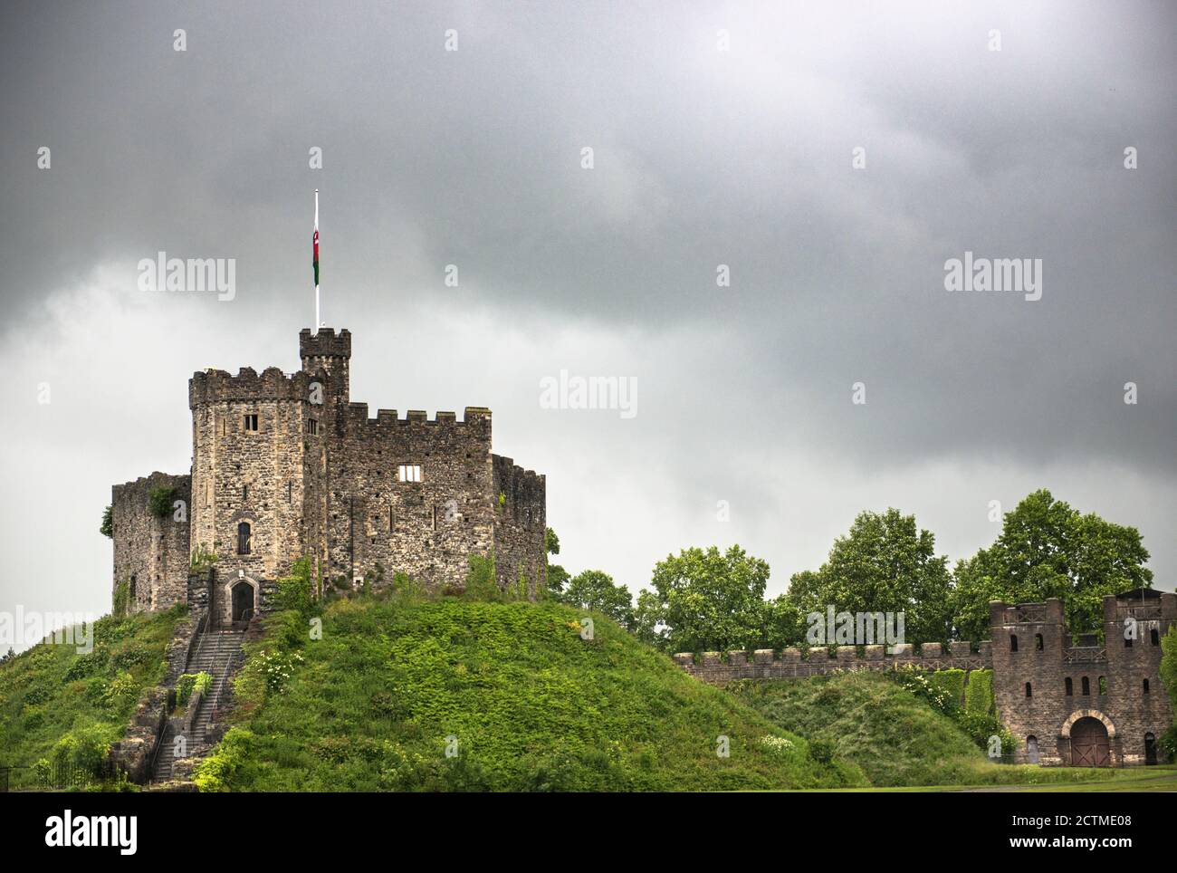 Cardiff Castle ruins and curtain wall on a gloomy, spooky rainy day. Wales, England. Castell Caerdydd. Owned by Cardiff City Council.  Copy space. Stock Photo