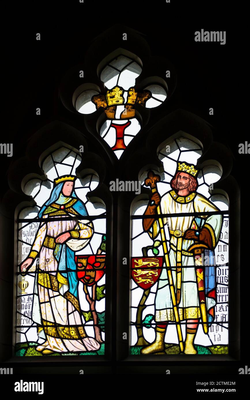 Cardiff Castle stained glass window. Banqueting Hall. Broken crown depicts the broken marriage of Prince John to Isabel of Gloucester. I for Ioannes. Stock Photo