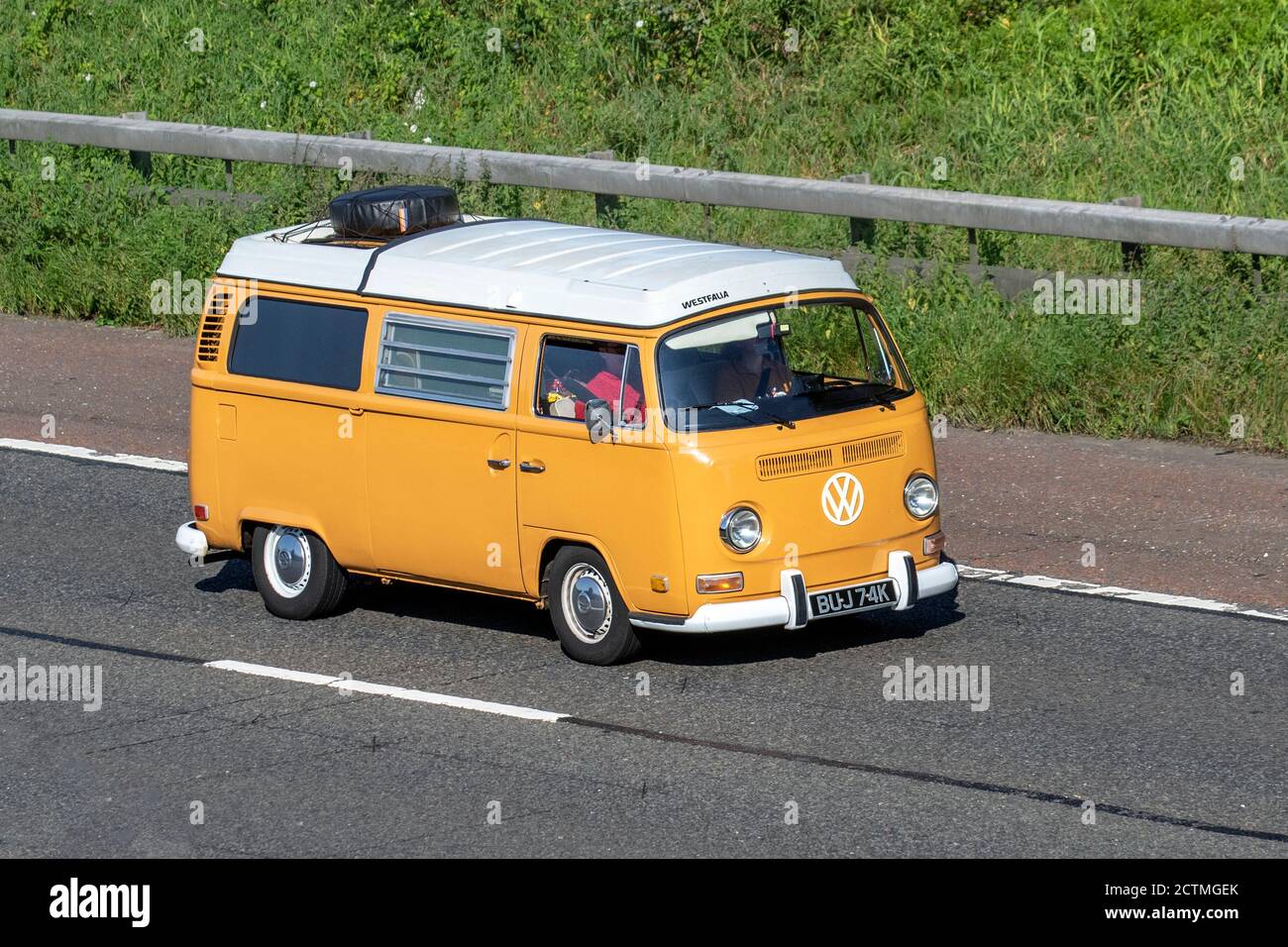 1972 70s old Bay window VW Volkswagen Westfalia Caravans and Motorhomes, campervans on Britain's roads, RV leisure vehicle, family holidays, caravanette vacations, Touring caravan holiday, 70s van conversions, Vanagon autohome, life on the road UK. Stock Photo