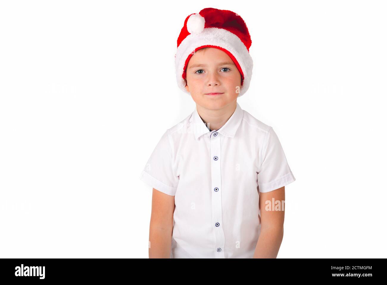 A young caucasian boy showing hand gesture. Kid portrait gesturing with fingers against. Funny emotions, facial expression, body language. Stock Photo