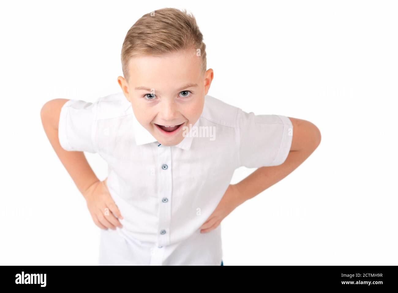 Portrait Of Joyful 9 Year Old Boy Handsome Caucasian Laughing And