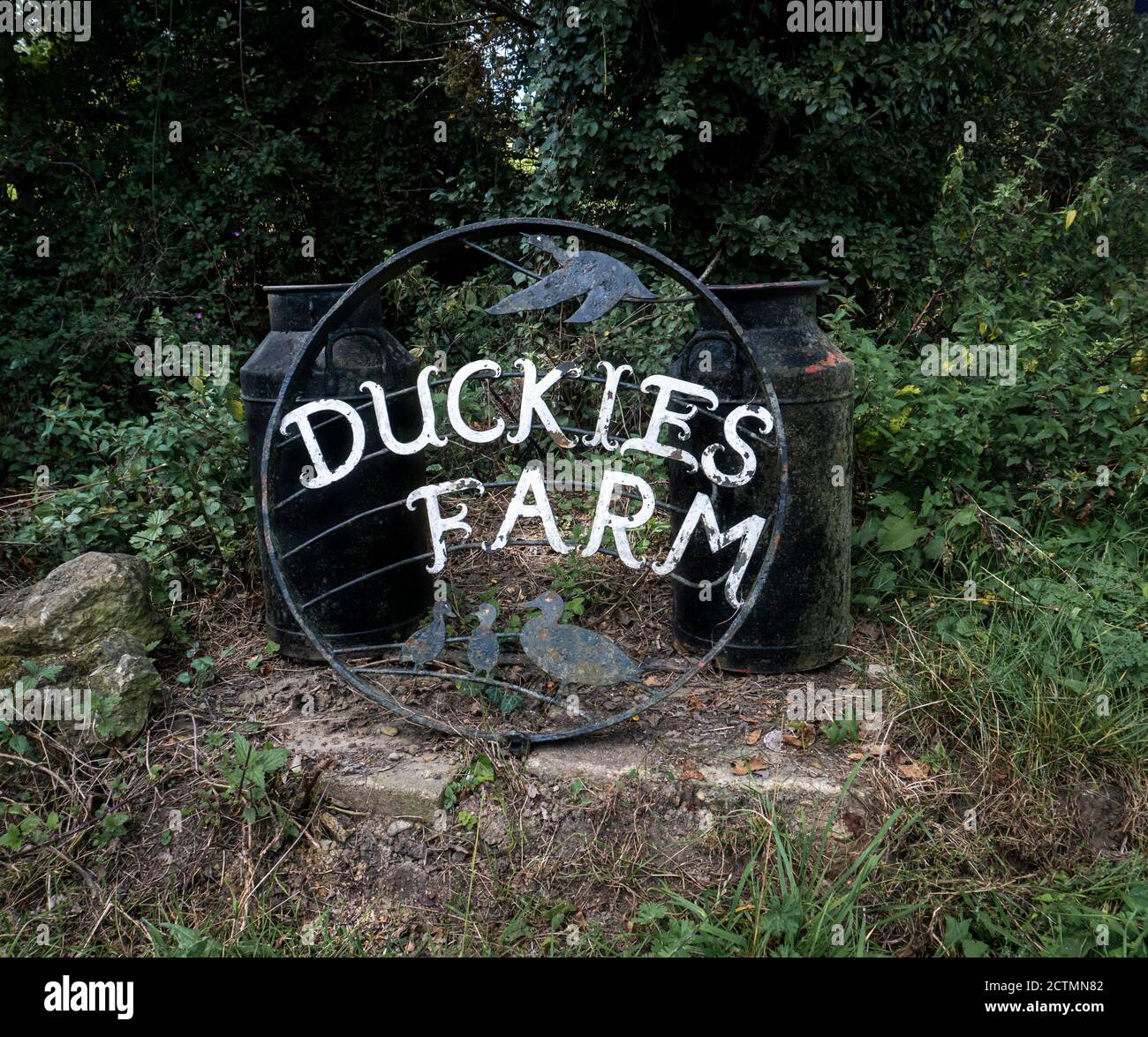 A wrought iron farm name sign for Duckies Farm Stock Photo