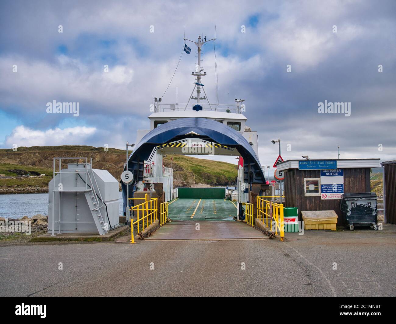 The interisland ro-ro car ferry Bigga at the Gutcher ferry terminal on the island of Yell in Shetland, UK Stock Photo