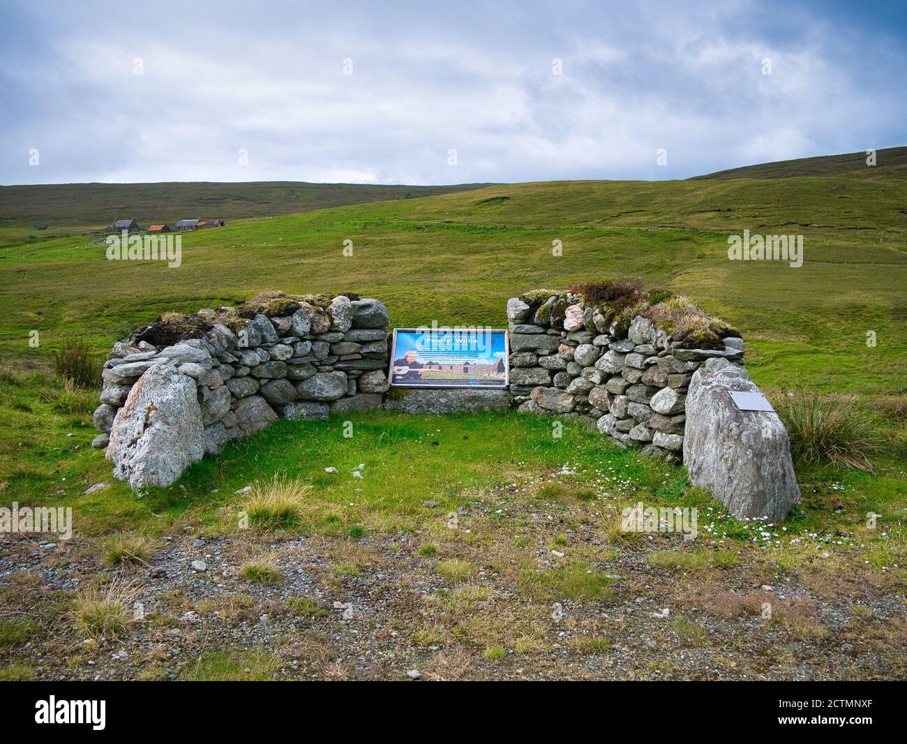 The memorial to 'Peerie' Willie Johnson - an influential Shetland folk musician - near Efstigarth on the island of Yell in Shetland, Scotland, UK Stock Photo