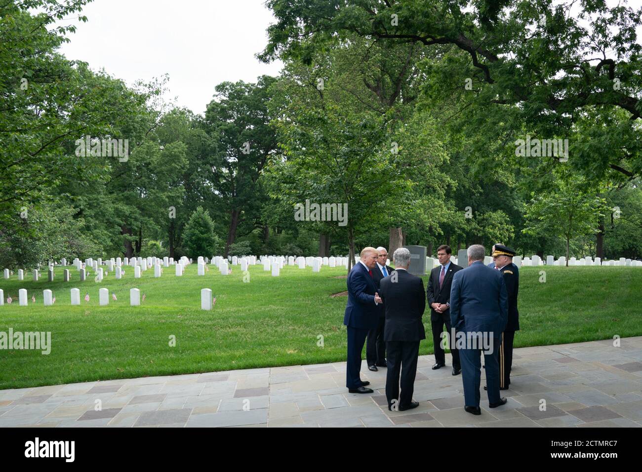 Memorial Day 2020. President Donald J. Trump, Vice President Mike Pence meet with Secretary of Defense Mark Esper,  U.S. military leaders and White House senior staff while attending the Memorial Day wreath-laying ceremony at the Tomb of the Unknown Soldier at Arlington National Cemetery Monday, May 25, 2020, in Arlington, Va. Stock Photo